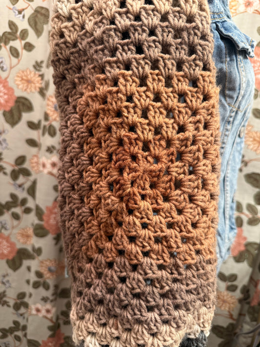 Upcycled denim jacket with crochet sleeves