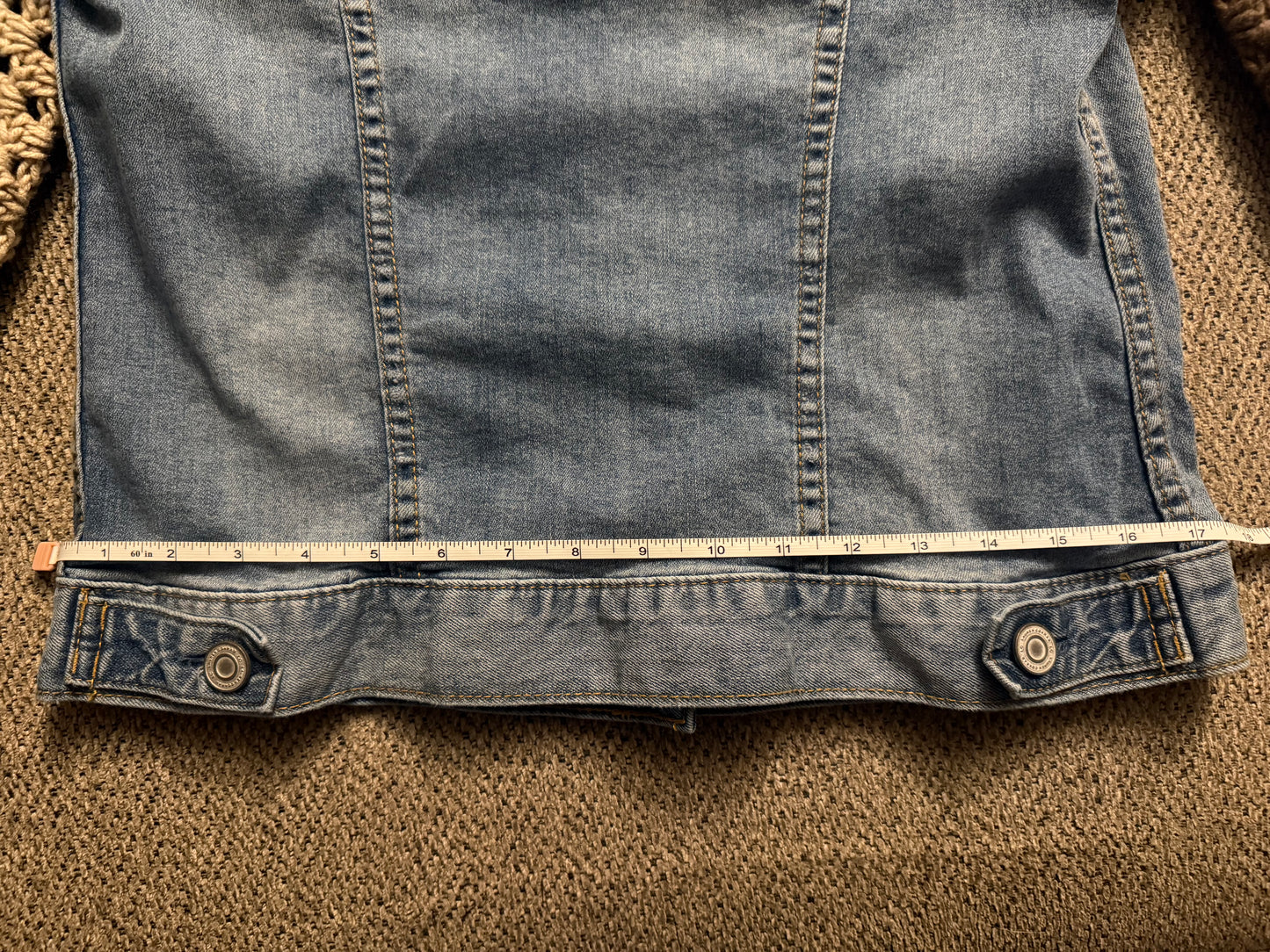Upcycled denim jacket with crochet sleeves