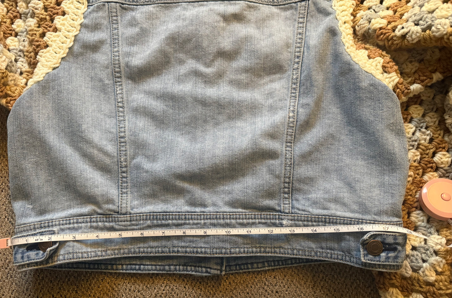 Upcycled denim jacket with crochet sleeves